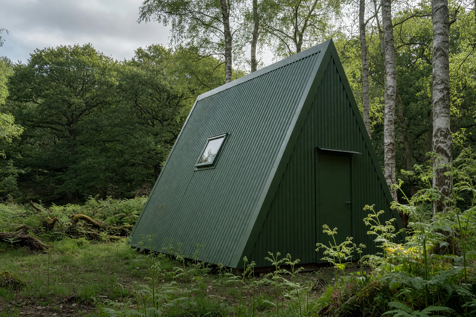Concept visualisation, not a photograph: moss green, in the trees in corrugated powder-coated steel.